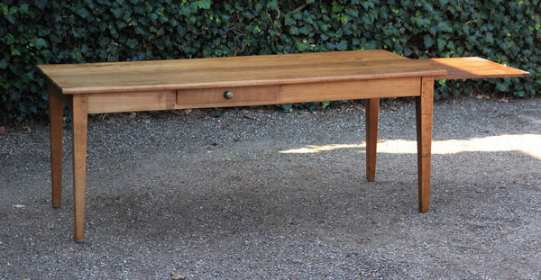 Antique Table with an Extendable Top