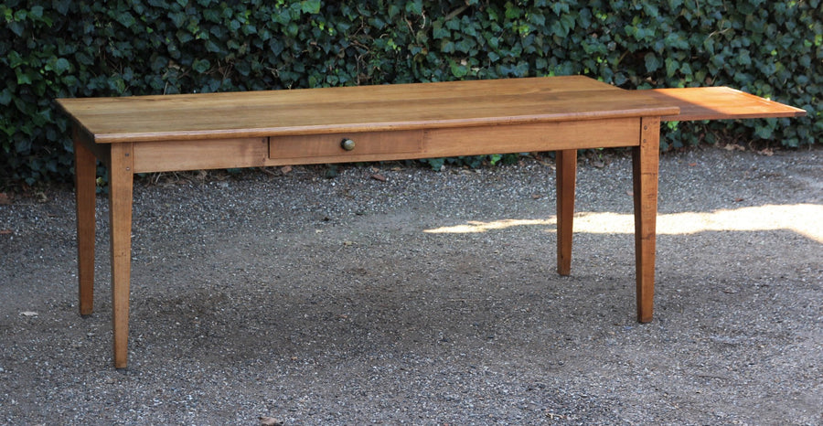 Antique Table with an Extendable Top